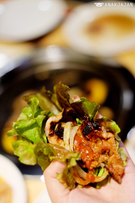 Wrap some meat inside lettuce and add a bit of Samjang sauce