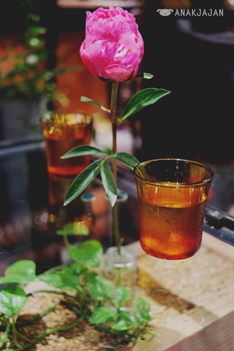Transparent table with fresh flowers