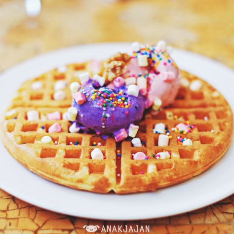 Freshly made waffle with ube ice cream