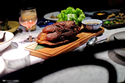Crispy pork hock on the bone with tamarind sauce and nam jim jeaw IDR 280k
