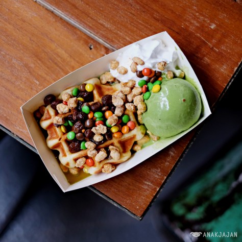 Belgian Liege Waffle Green Tea IDR 35k served with Green Tea Ice Cream, Whipped Cream, M&M's and Rhum Raisin Sauce