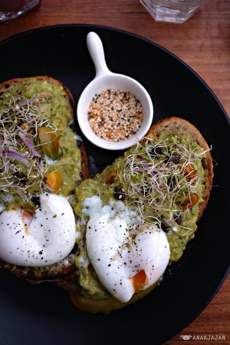 Smashed Avocado and Feta Cheese with Poached Egg on Sourdough IDR 65k