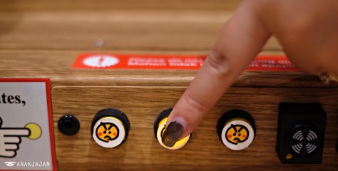 push the button to return the sushi train